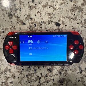 Sony Handheld Console - Black and Red